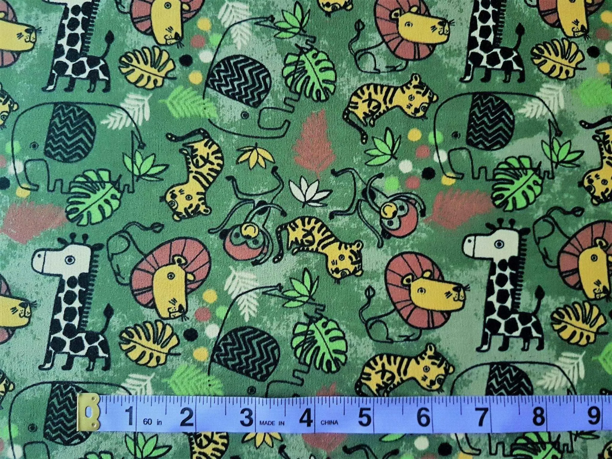 French Terry Safari Animals on Dark Green